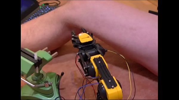 Robot sticking needles in balls